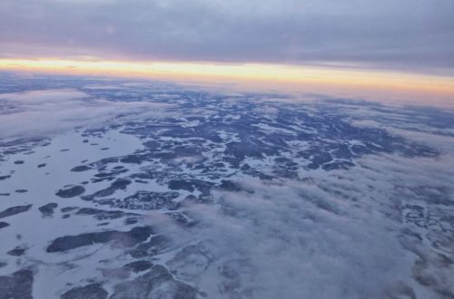 Finnland von oben Flugzeug Schneelandschaft